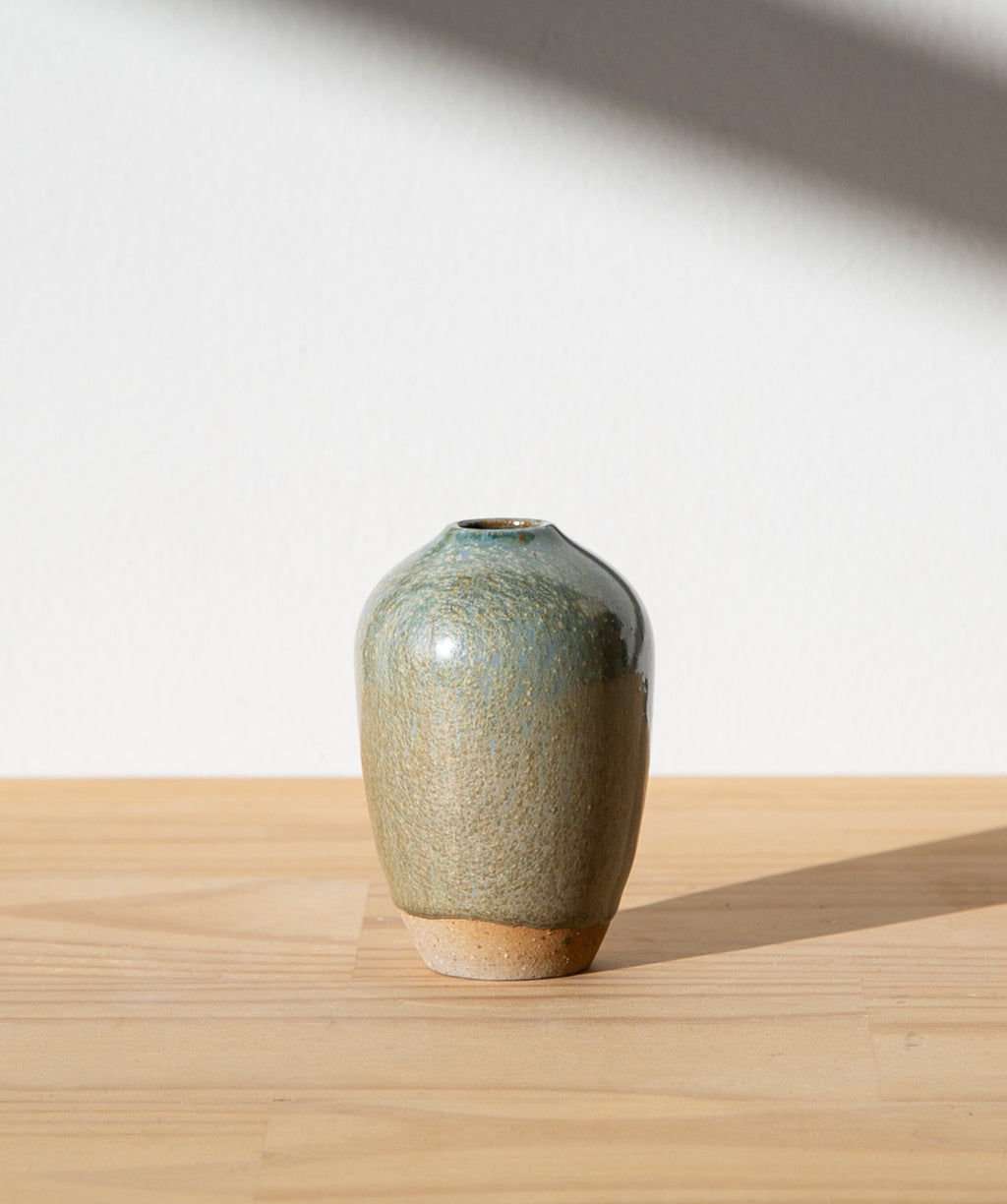 Pale blue bud vase