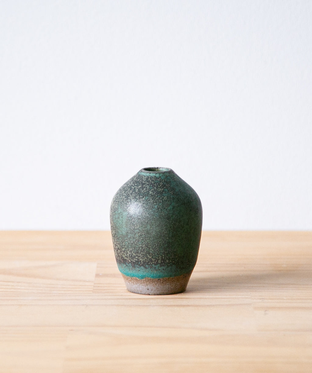 Speckled oribe bud vase