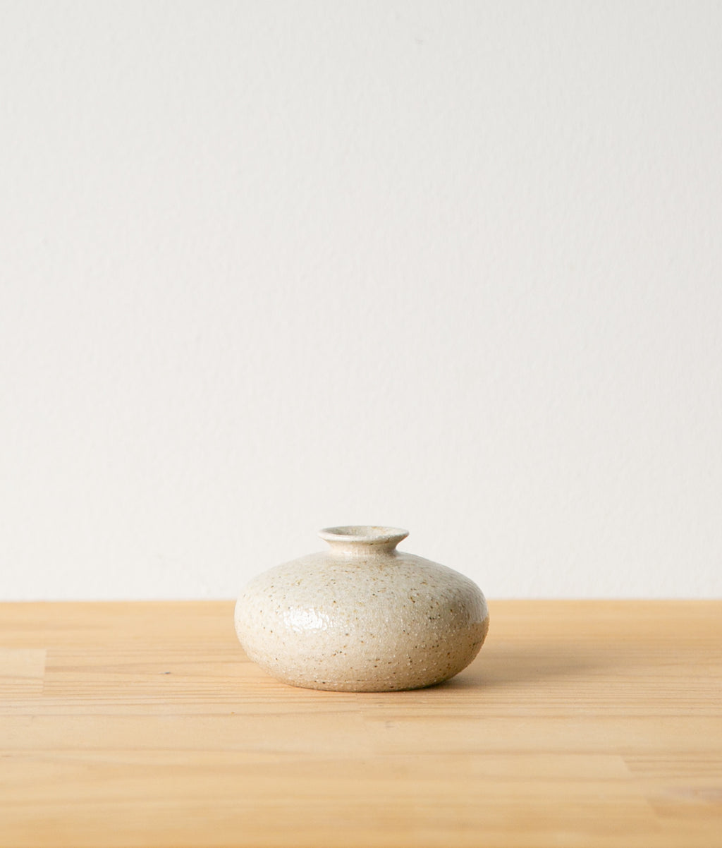 Round vase with dramatic drip