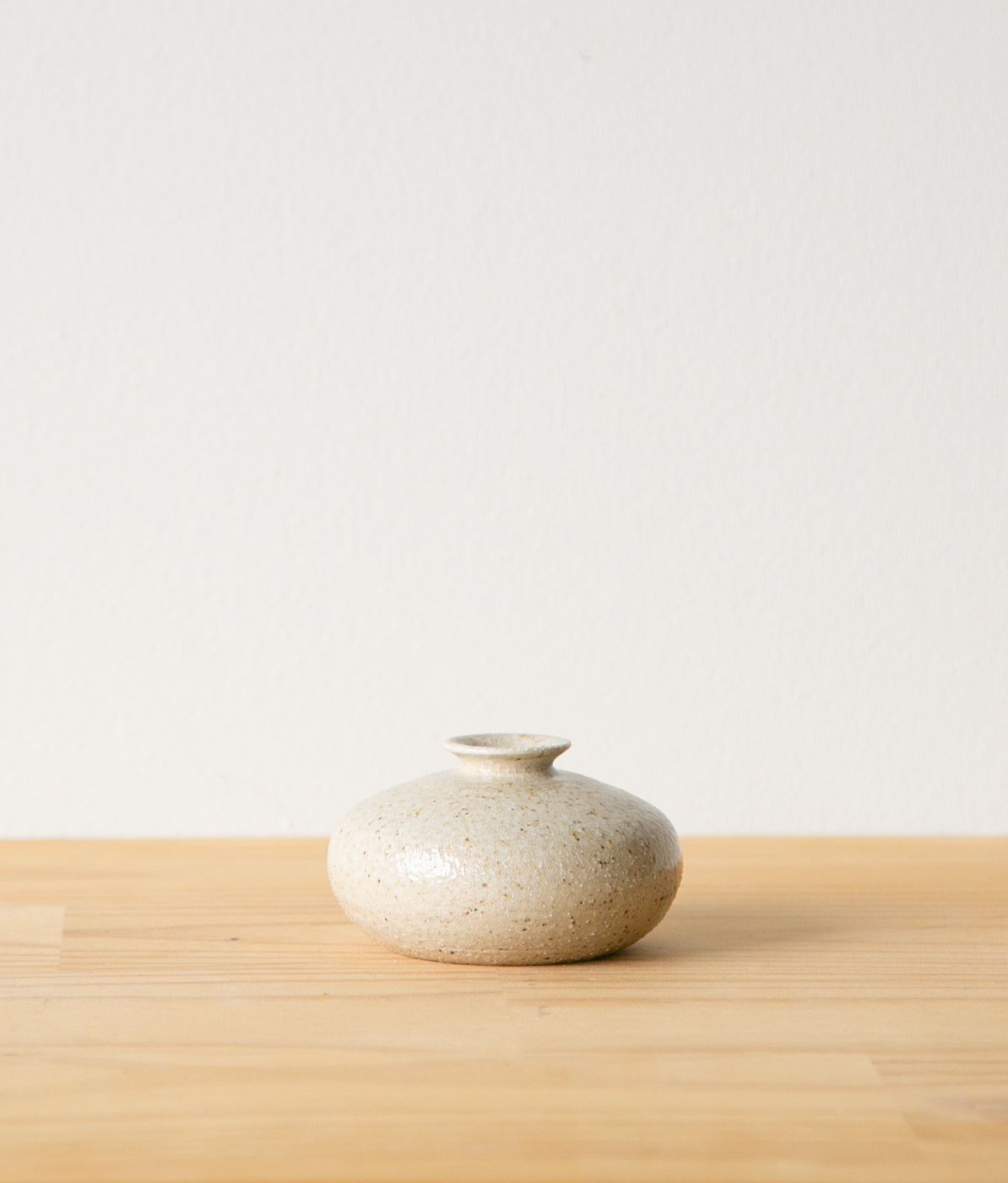 Round vase with dramatic drip