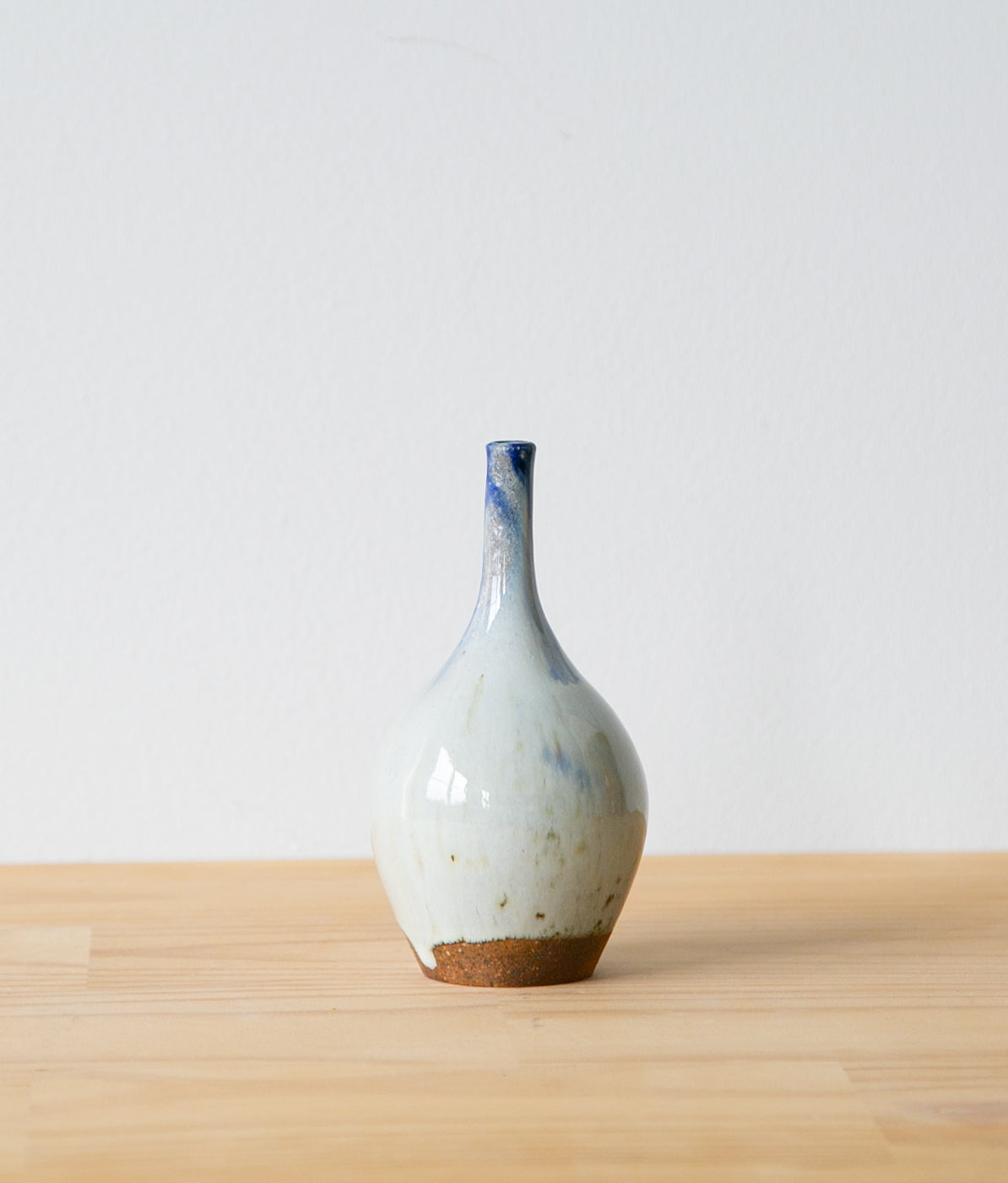 White teardrop vase with cobalt