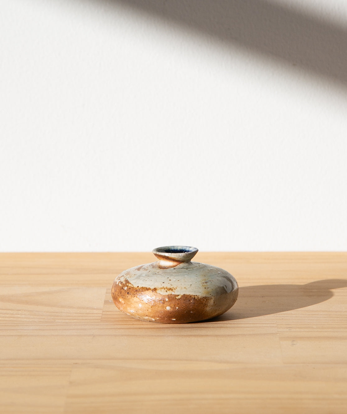 Swirled sand oil jar