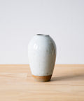 Speckled white vase