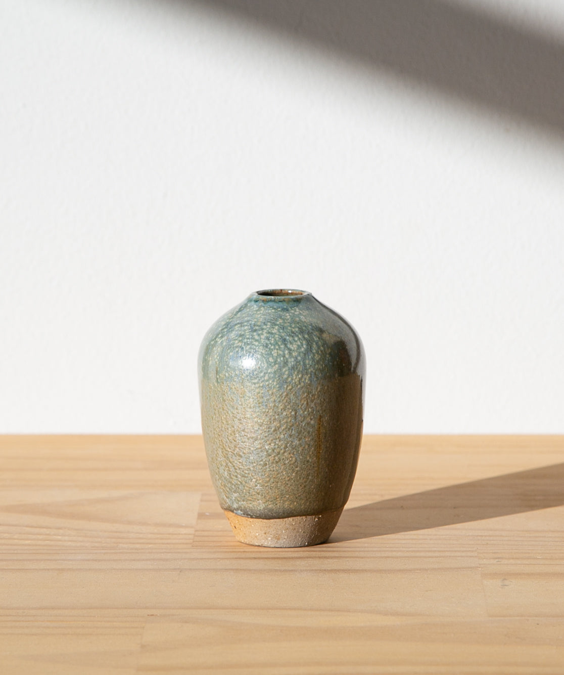 Pale blue bud vase