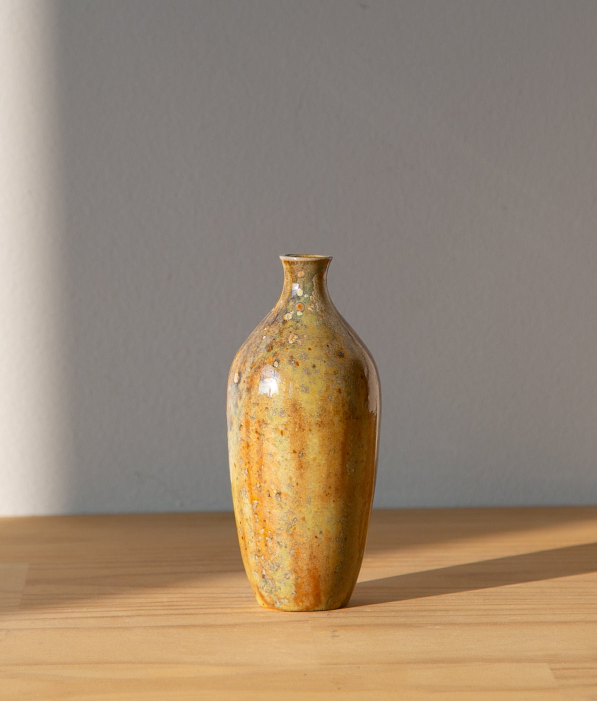 Subtly striated opal vase