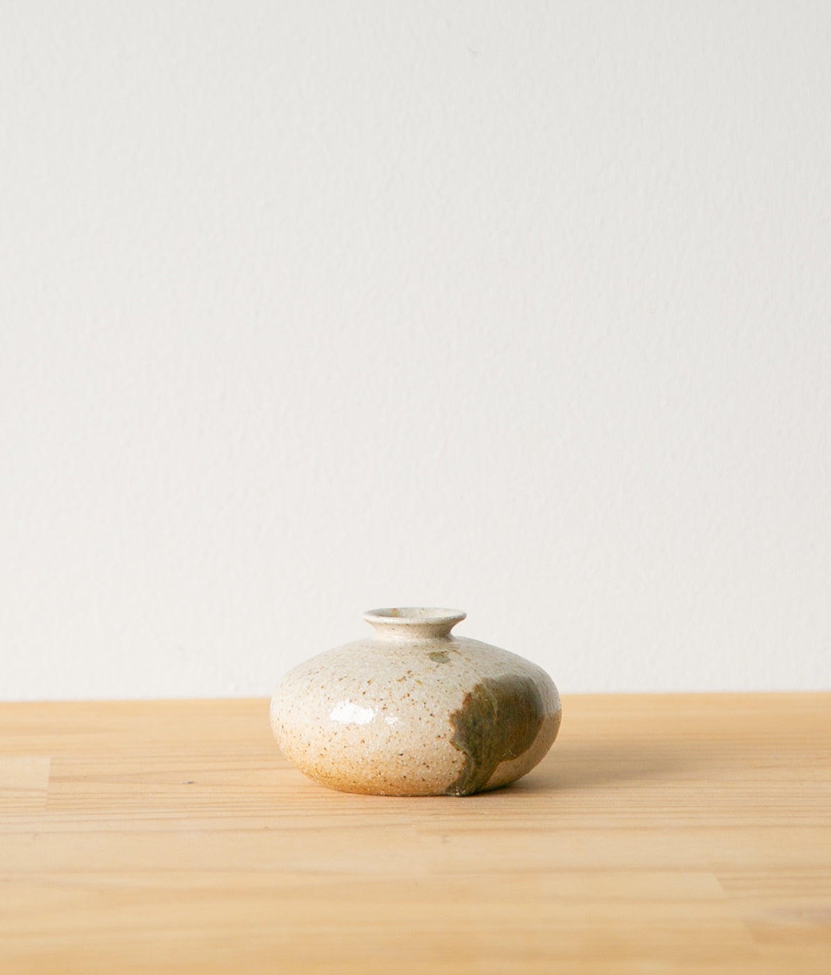 Round vase with dramatic drip