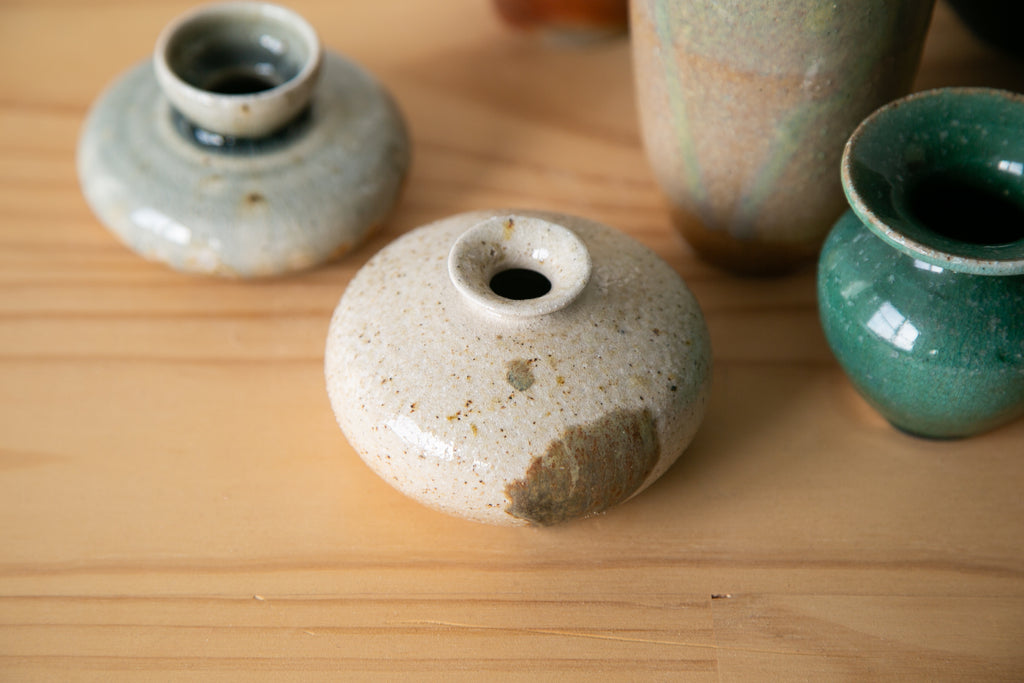 Round vase with dramatic drip