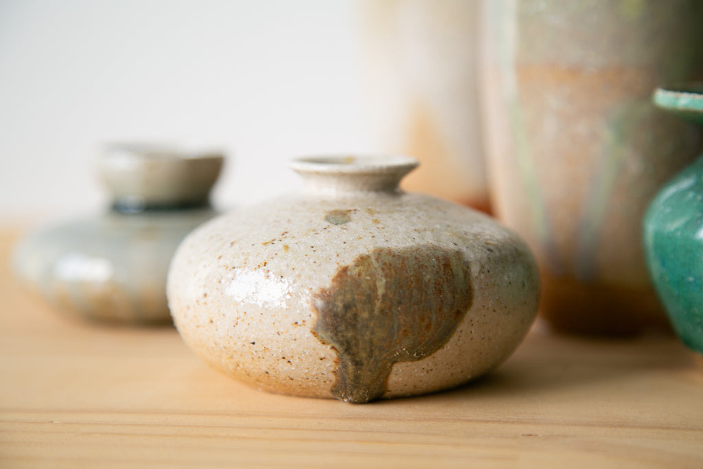 Round vase with dramatic drip