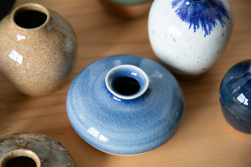 Sky blue oil jar vase