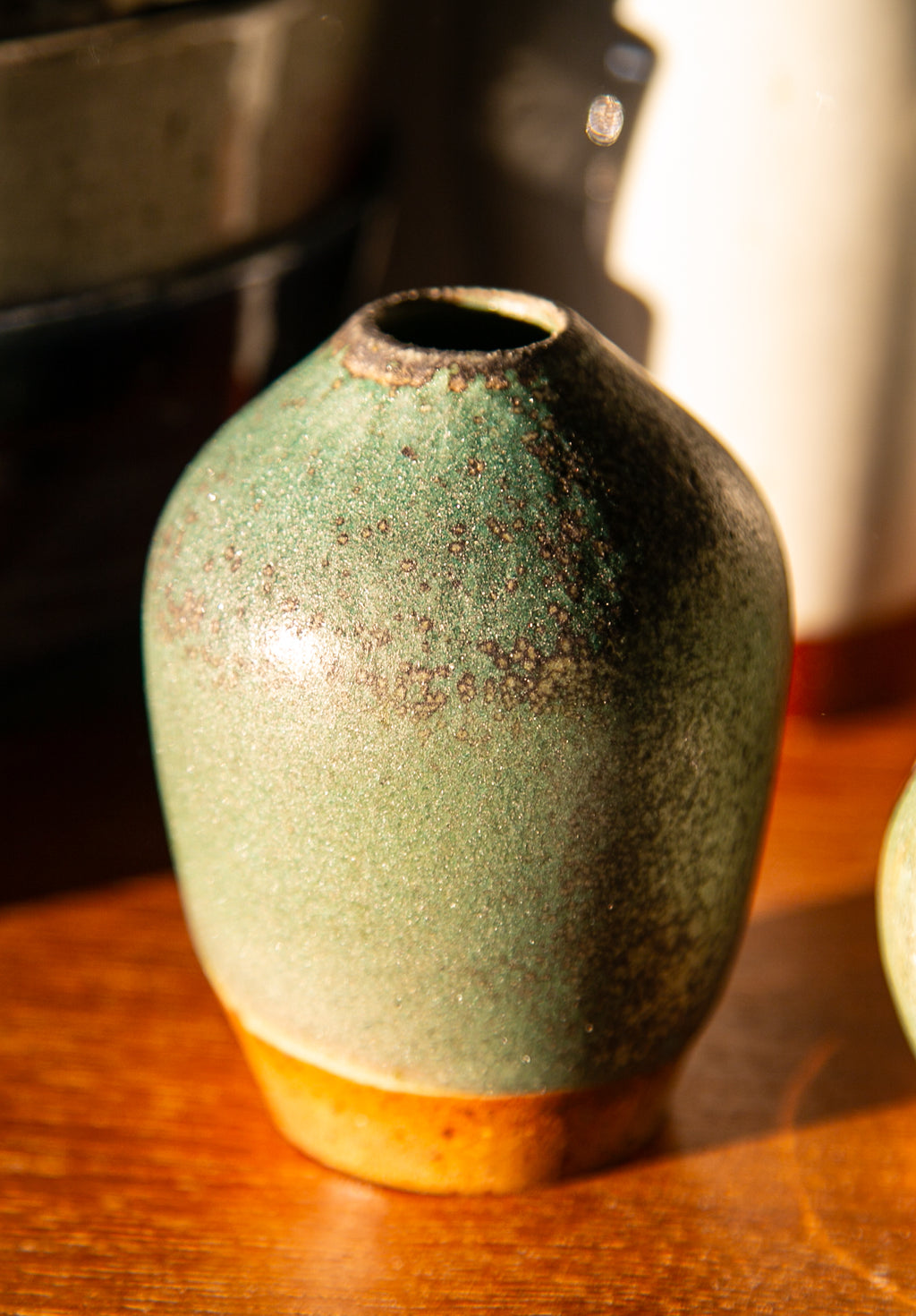 Speckled oribe bud vase