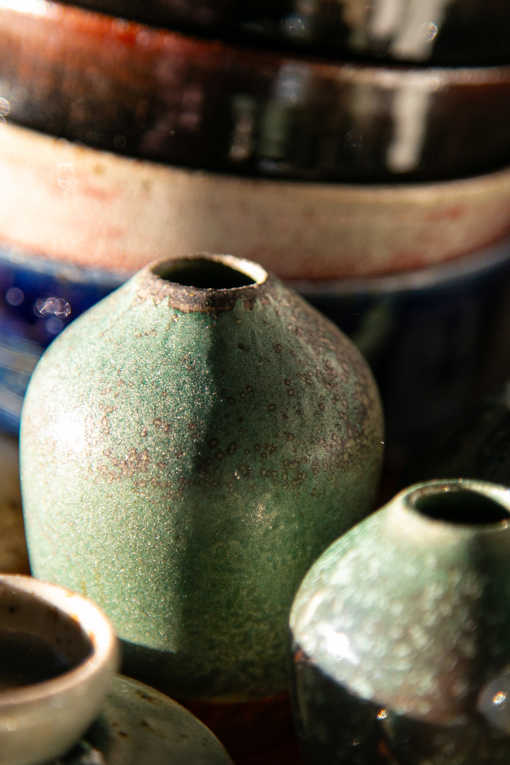 Speckled oribe bud vase