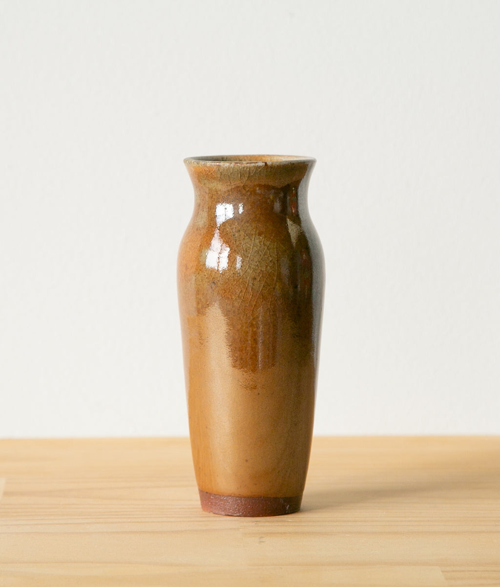 Slim, warm brown vase