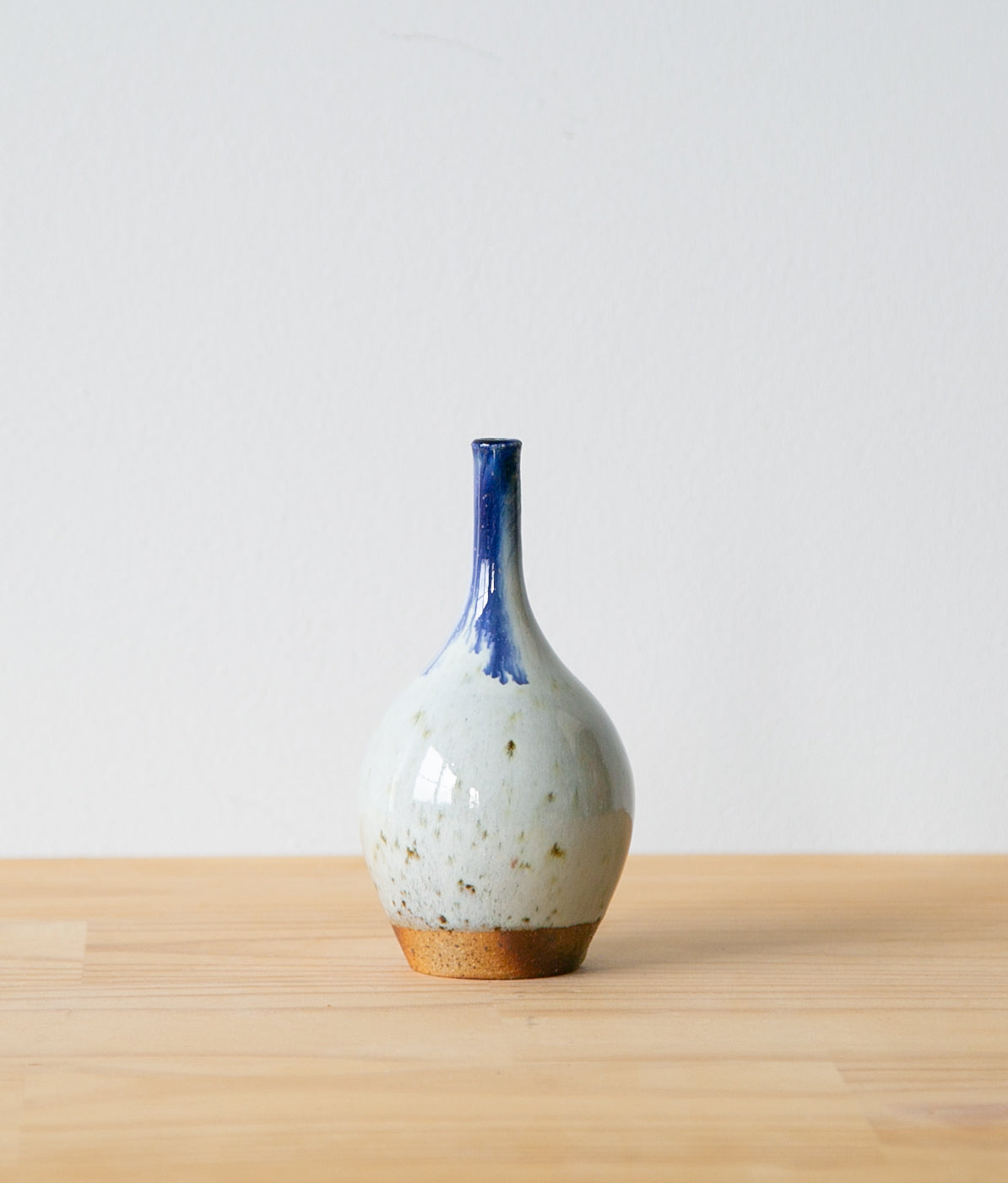 White teardrop vase with cobalt