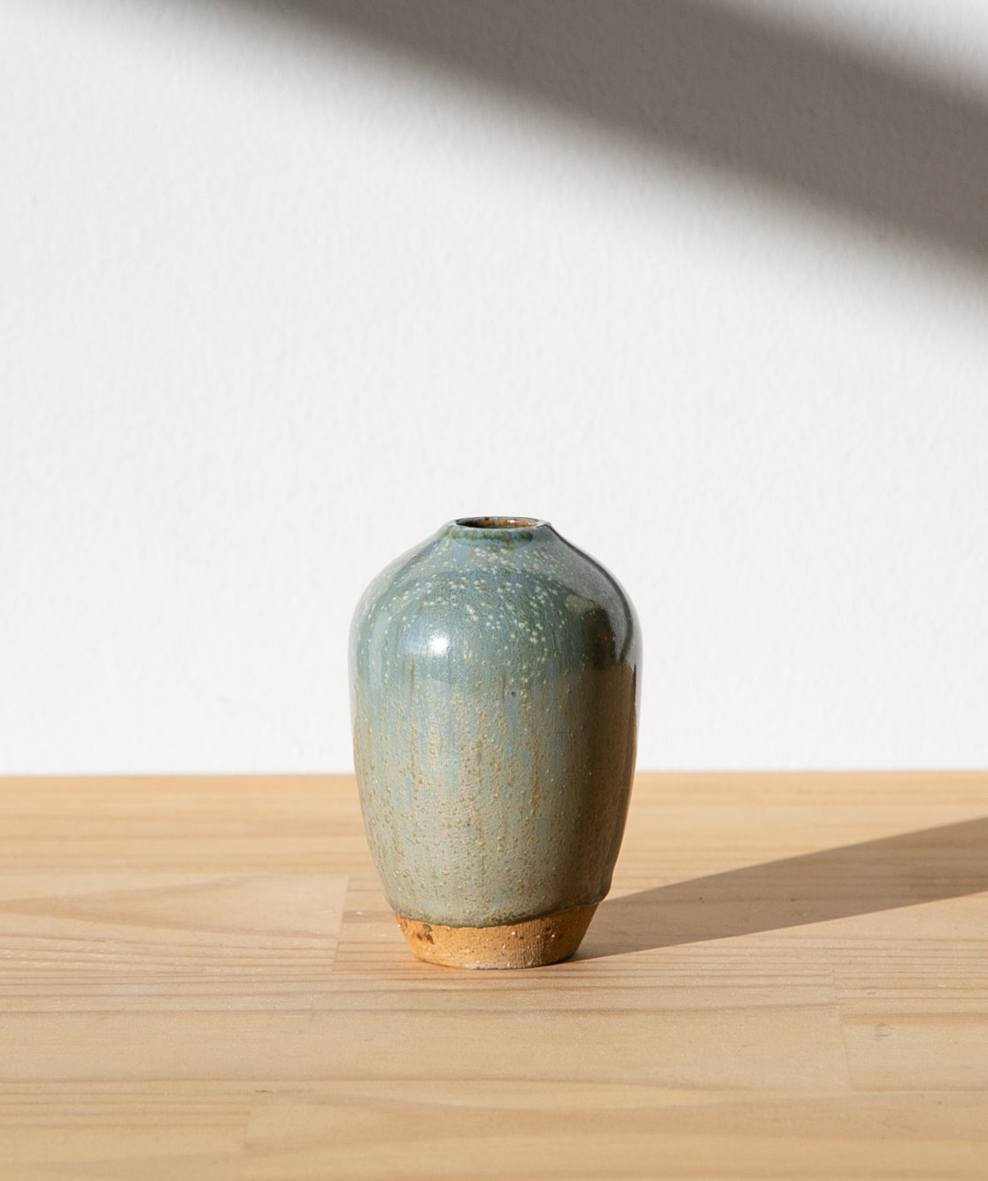 Pale blue bud vase