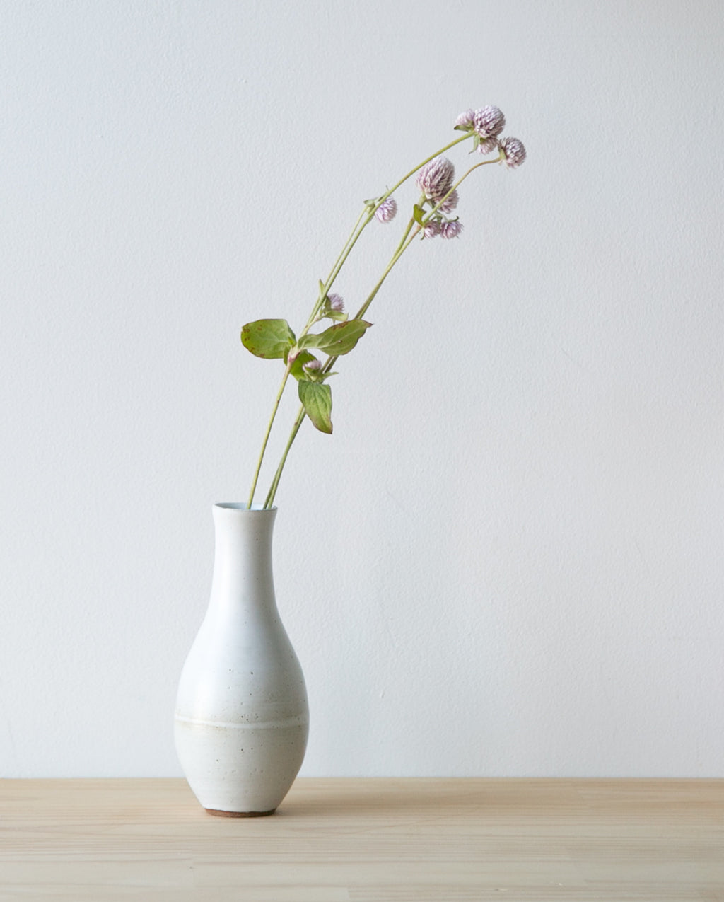 slim white bud vase